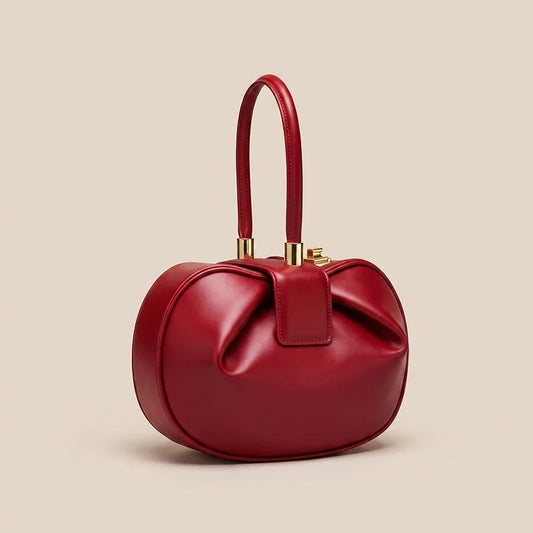 Runde Handtasche mit oberem Griff